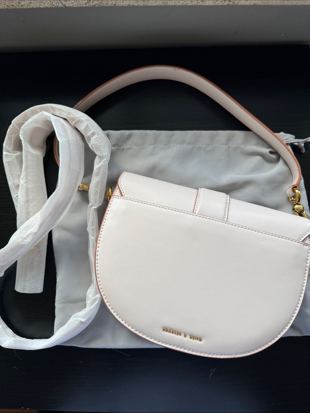 Charles & keith Women's Cream Saddle Crossbody Bag - Elegant Everyday Style